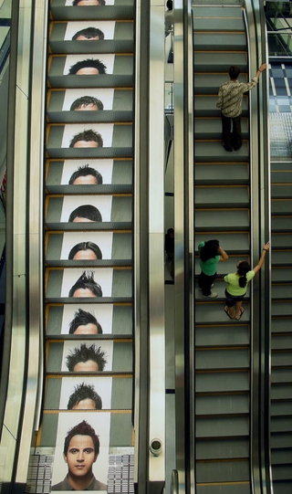 Illustration for article titled Escalator Ads Are the Most Awkward Way to Advertise